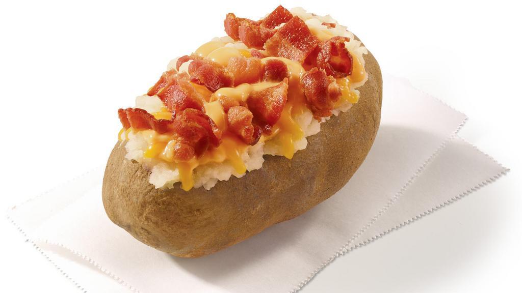 Bacon Cheese Baked Potato · This hot potato is loaded with creamy cheddar cheese sauce and crisp, Applewood smoked bacon. Because nothing goes with a spud like cheese and bacon.