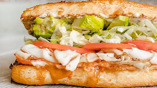 34. HUNTER PENCE · Turkey, Bacon, Avocado, BBQ Sauce, Honey Mustard, Pepper Jack, Swiss, Cheddar. All sandwiches are served hot with dirty sauce, lettuce, and tomato. [1570 cal]