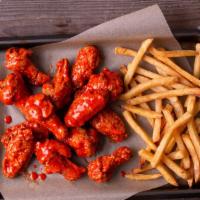 40 Wing Combo · 40 antibiotic-free wings fried to a crisp, with your choice of 4 flavors, of 2 sides, 4 drin...