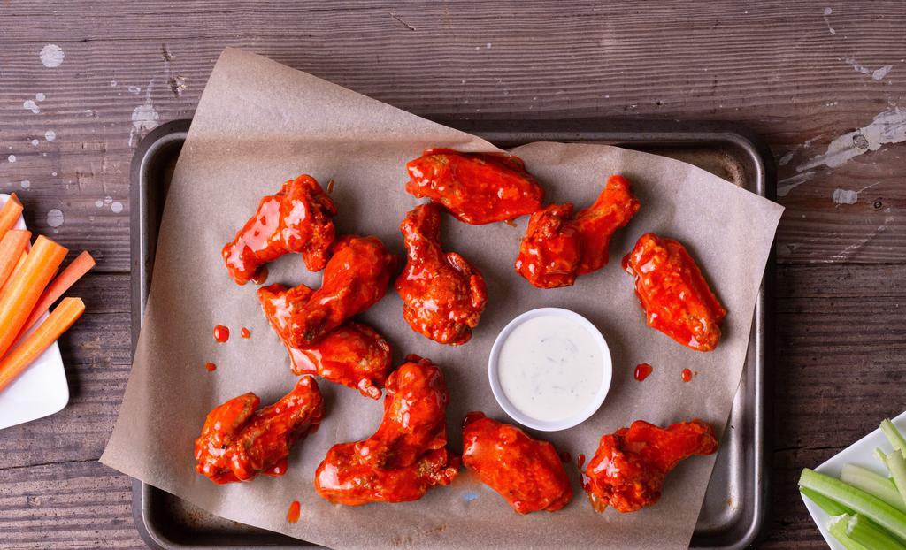 12 Wings · 12 antibiotic-free wings fried to a crisp, with your choice of 2 flavors.