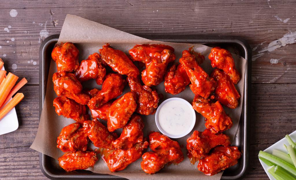 20 Wings · 20 antibiotic-free wings fried to a crisp, with your choice of 2 flavors.
