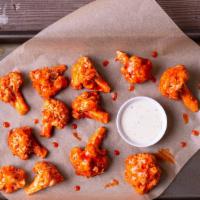Small Cauliflower Wings (8Oz) · Vegetarian. Breaded Cauliflower for a healthier vegetarian snack, with your choice of flavor.