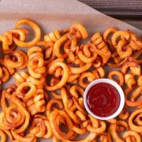 Curly Fries · Crispy Seasoned Curly Fries, the perfect addition to any wing