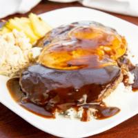 Loco Moco · Your choice of meat layered on a bed of steamed rice, topped with two eggs fried over easy a...