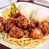 Sesame Chicken · Tender morsels of chicken thighs battered and fried and then tossed in teriyaki sauce with s...