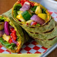 Veggie Wrap · Grilled Seasonal Vegetables, Mixed Greens, Hummus Wrapped in a Spinach Tortilla. Vegan.
