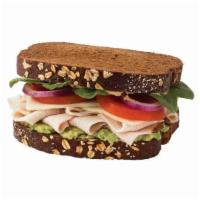 California Turkey Sandwich · Includes Turkey breast, Avocado, Tomatoes, Red onion, Spinach, Dijon Mustard, Jack cheese, N...