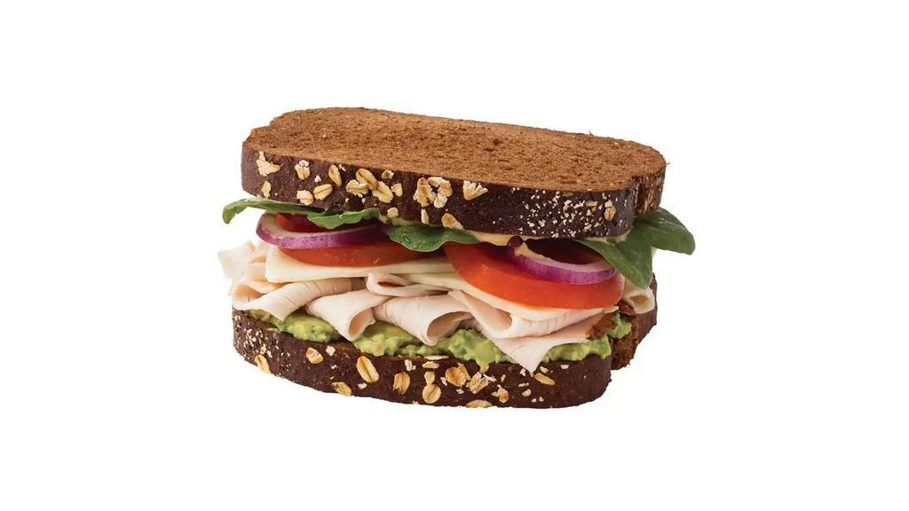 California Turkey Sandwich · Includes Turkey breast, Avocado, Tomatoes, Red onion, Spinach, Dijon Mustard, Jack cheese, Native Grain bread.