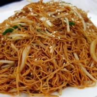 Soy sauce chow mein · Chow Mein with Onion slices, Carrot slices, & Sprout.
