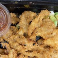Chicken Bites with House Sauce · Chicken tempura with house sauce.