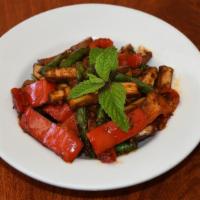 Fiery Tofu with Vegetables · Stir fry tofu with green bean, basil and bell pepper in house sauce.