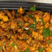 Mint Chicken · Diced chicken tossed with mint leaf, cilantro, chili paste, garlic, ginger, soy paste and cu...