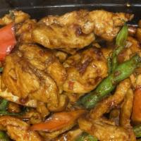 Fiery Chicken with Tofu · Chicken breast strips sautéed with tofu, string beans, red bell pepper, basil with special s...