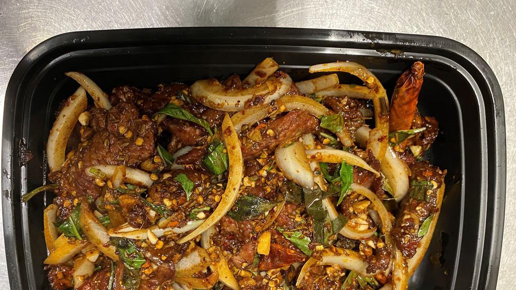 Spicy Chilli Beef · Stir fry beef strips in chili, onion and basil.