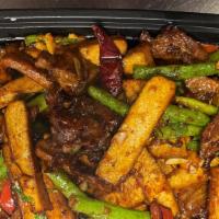 Fiery Lemon Beef · Beef strips sautéed with tofu, string beans, red bell pepper, basil with special lemon sauce.