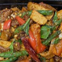 Fiery Lemon Lamb · Lamb strips sautéed with tofu, string beans, red bell pepper, basil with special lemon sauce.
