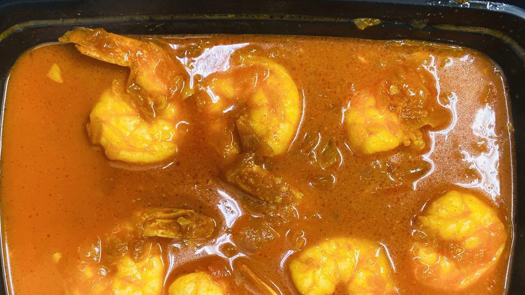 Burmese Shrimp Curry · Burmese style shrimp curry, with tomato, onion and cilantro.