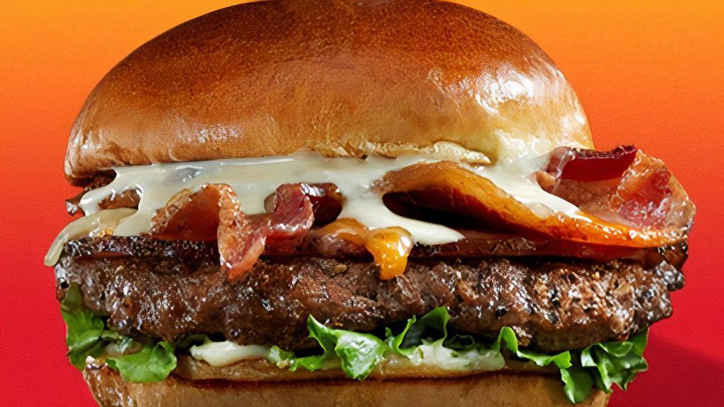 Beastmode Bacon Burger · Blue moon BBQ braised pork belly, Applewood smoked bacon, sharp white cheddar, bacon jam, lettuce, roasted tomato aioli.