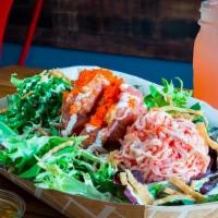 Ahi Tuna Salad · Sashimi, seaweed salad, seasoned soba noodles, wonton crisps, wasabi mayo, imitation crab sa...