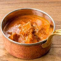 Butter Chicken · White meat, tandoor roasted chicken in creamed tomato sauce.