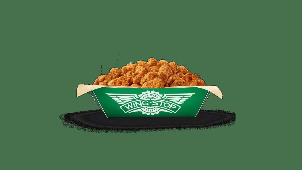 Large Thigh Bites · 1 large order of juicy, breaded, bite-sized boneless chicken in your favorite flavor.
