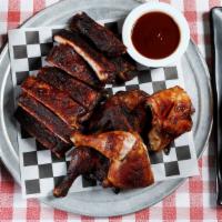 Combo Family Pack · A full slab (12 bones) of our famous Texas BBQ Ribs and a whole lone star BBQ chicken. Comes...
