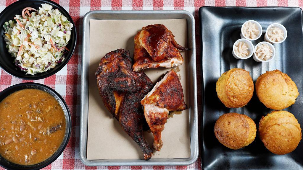 Lone Star Chicken Family Pack · A whole large fresh California chicken cut into quarters, pit-smoked and basted in our wood burning Barbeque pit. Comes with Four Cornbread Muffins and two classic sides.