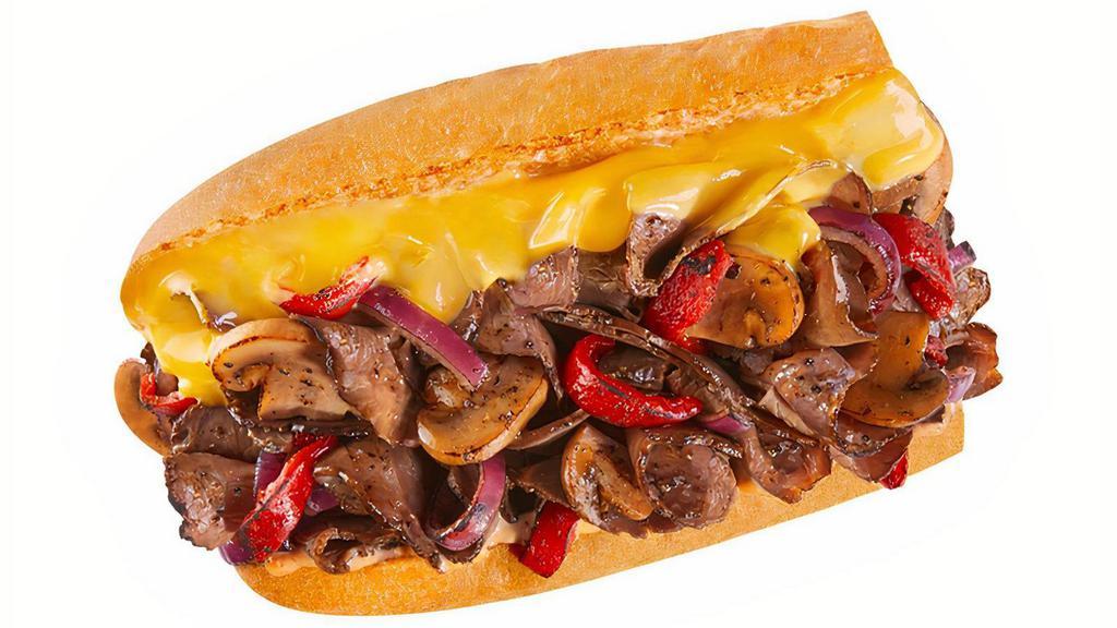 #35 Cheese Steak · 1/4 lb. of warm, tender steak combined with sautéed mushrooms, roasted red peppers, and sliced onions covered with gooey, melty American cheese and just enough chipotle mayo to kick up the flavor