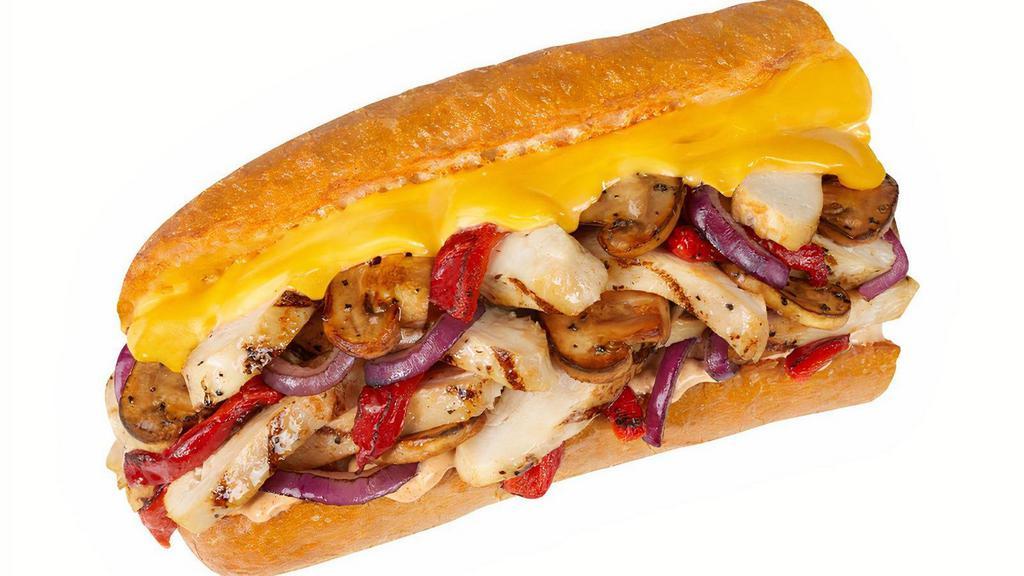 #45 Chicken Cheese Steak · 1/4 lb. of our all-natural, rotisserie-style chicken combined with sautéed mushrooms, roasted red peppers, and sliced onions covered with gooey, melty American cheese and just enough chipotle mayo to kick up the flavor