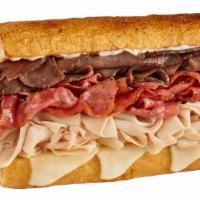 #33 Triple Dip · 1/2 lb. of hot roast beef, turkey & pastrami, with mayo, provolone & hot au jus
