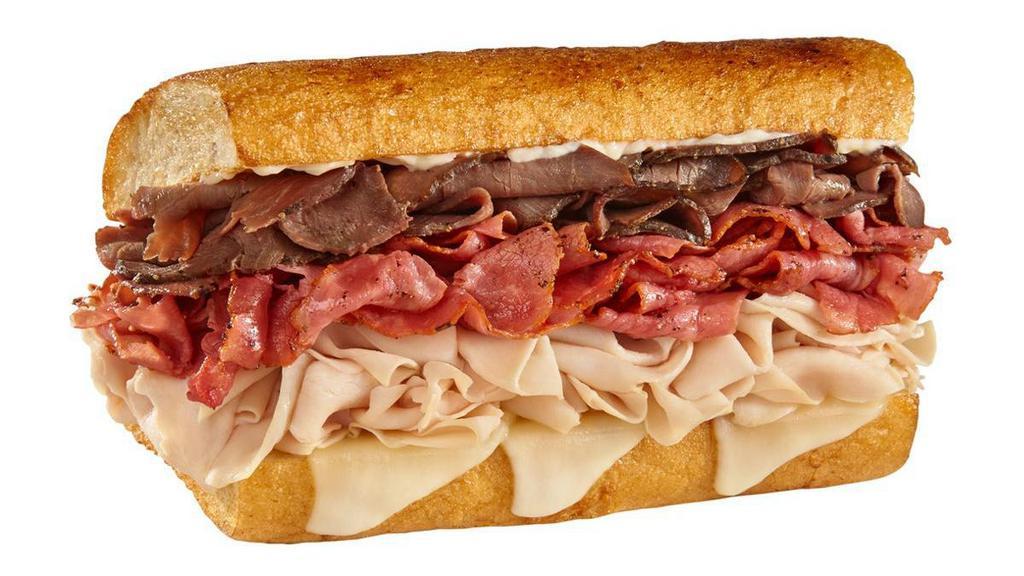 #33 Triple Dip · 1/2 lb. of hot roast beef, turkey & pastrami, with mayo, provolone & hot au jus