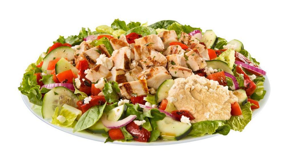 Mediterranean Chicken Salad · Grilled chicken, hummus, feta, roasted red peppers, cucumbers, tomatoes, red onions & Balsamic dressing
