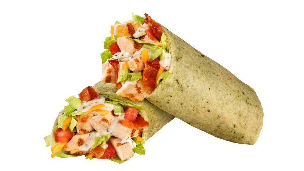 Bacon Ranch Chicken Wrap · Chicken, bacon, cheddar cheese, lettuce and tomatoes, with Ranch dressing, wrapped in a spinach tortilla