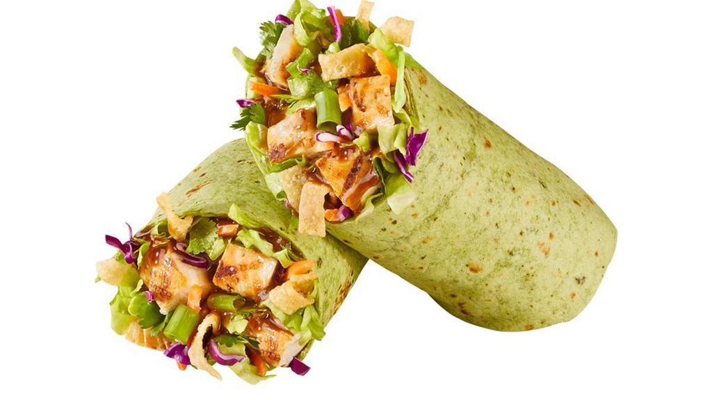 Asian Chicken Wrap · Carrots, cabbage, green onions, cilantro, wonton strips & sesame seeds, with Asian dressing, wrapped in a spinach tortilla