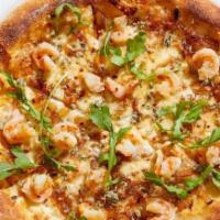 Shrimp Scampi Pizza · Housemade lemon-garlic shrimp with caramelized onions, Mozzerella, Parmesan and red chili, t...
