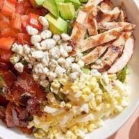 Catering California Cobb Salad · Nueske's applewood smoked bacon, avocado, chicken, tomatoes, chopped egg, fresh basil and Go...