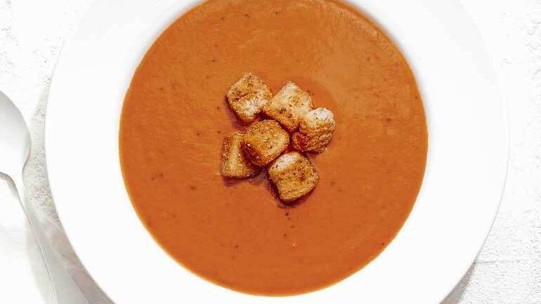 Tomato Basil Bisque · With a touch of cream, topped with housemade garlic butter croutons.