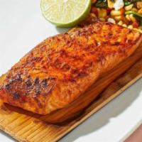 Cedar Plank Salmon* · North Atlantic salmon roasted on a cedar plank in our hearth oven with smoked paprika and li...