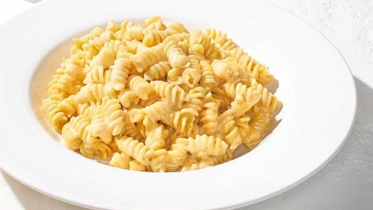 Catering Mac 'N' Cheese · Our creamy cheese sauce served over fusilli.