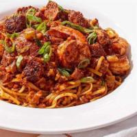 Catering Jambalaya Linguini Fini · Blackened chicken and shrimp, Andouille sausage and Tasso ham in our spicy Cajun sauce.