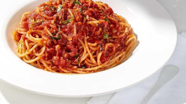 Tomato Basil Spaghetti · With sautéed garlic and fresh basil.