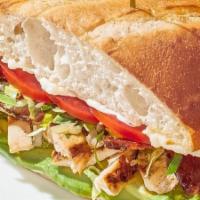 Chicken California Club Sandwich · Grilled chicken breast with fresh avocado, Nueske's applewood smoked bacon, crisp Romaine an...