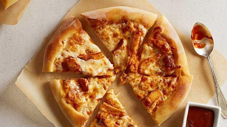 Kids Original Bbq Chicken Pizza · BBQ sauce, chicken and Mozzarella.  Try it with our plant-based chicken for an additional $1!
