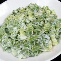 Kids Cpk Salad · Crisp Romaine tossed with herb ranch dressing.  Optional salad dressings available.