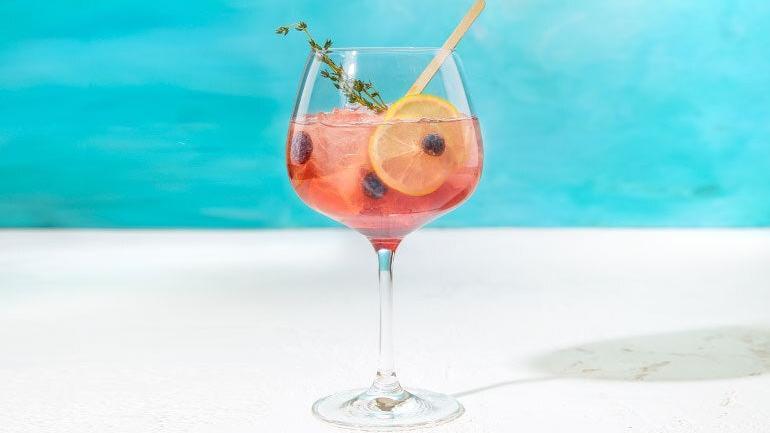 Sparkling Berry-Lemon · Perfectly refreshing Perrier Lemon Sparkling Water with a light berry flavor, fresh lemon, blueberries & thyme.