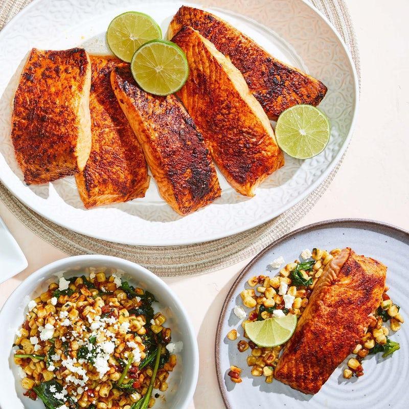 CATERING CEDAR PLANK SALMON* · Served with white corn & spinach succotash topped with Feta.