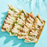 Large - Cold Sandwich Package · An assortment of our cold sandwiches paired with a Classic Caesar Salad.. 30 Half Sandwiches...