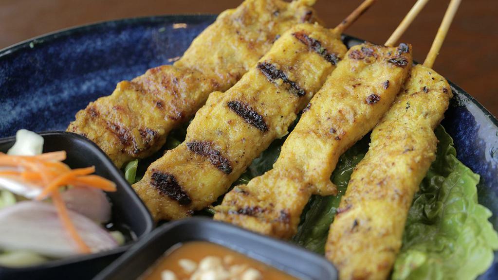 Chicken Satay( Gluten Free) · Grilled marinated chicken on skewers served with peanut sauce and cucumber salad.