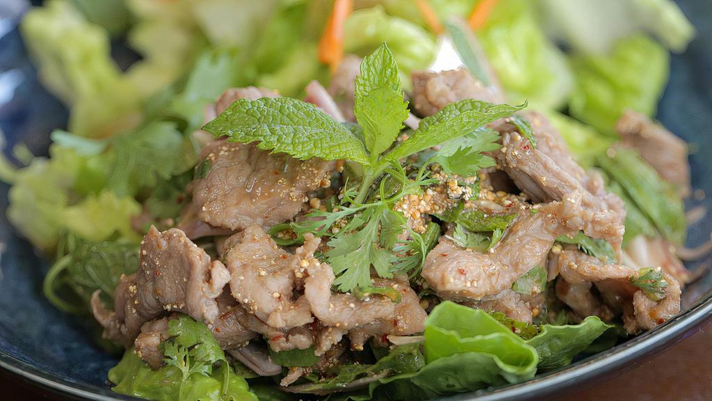 Beef Salad(gluten free) · Grilled beef with tomato, onion, green onion, carrot and thai lime dressing.