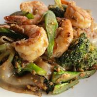 Pad See Ew · Pan-fried flat rice noodles with chinese broccoli, broccoli, egg and choice of meat or tofu.